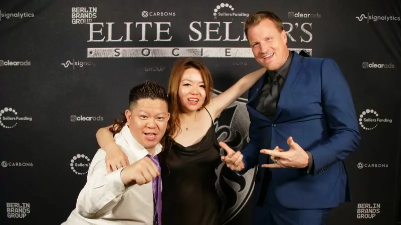 ESS members at event backdrop